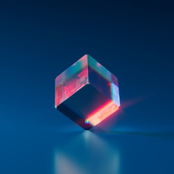 a crystal cube balancing on one apex